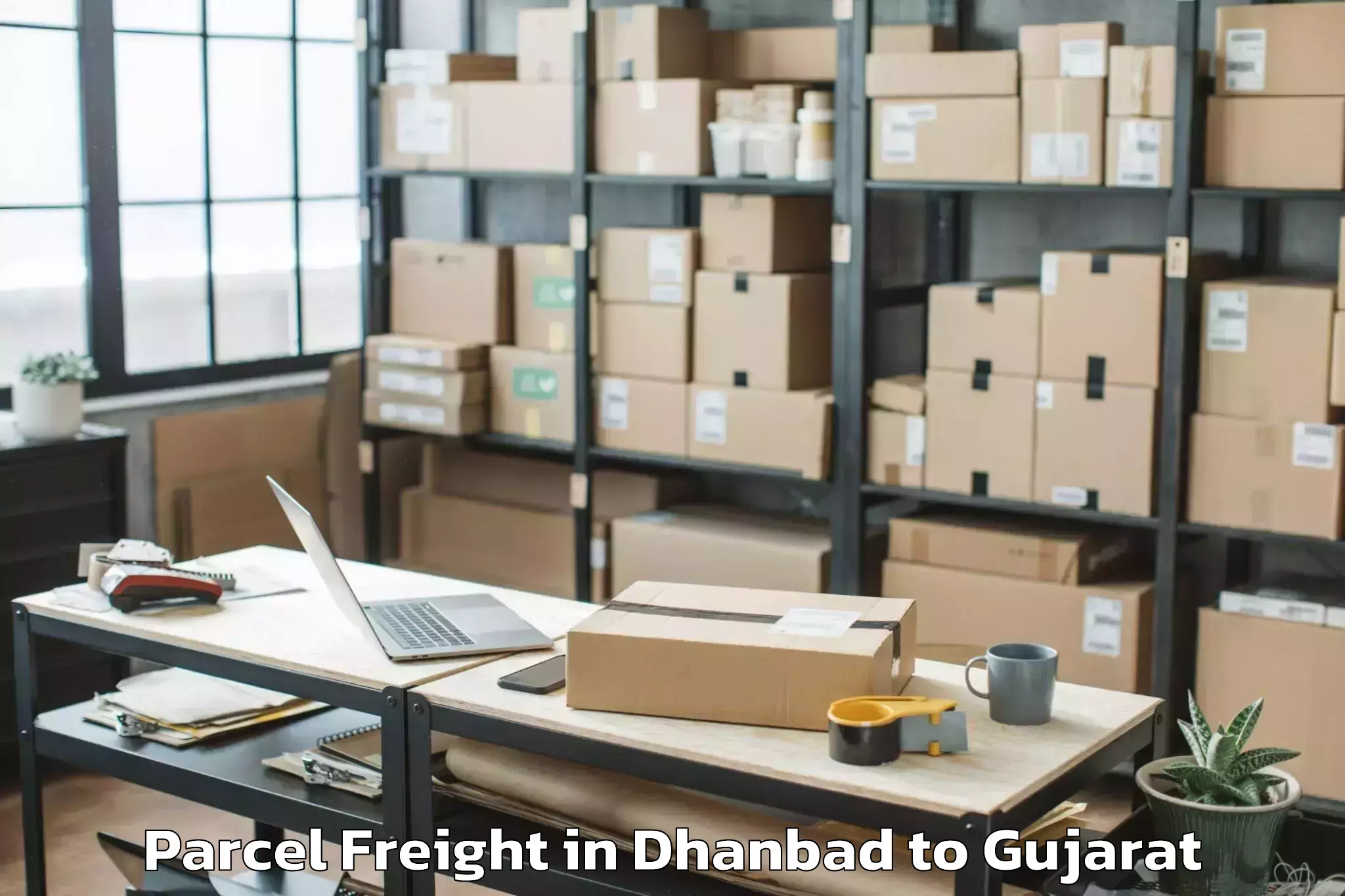 Top Dhanbad to Jambusar Parcel Freight Available